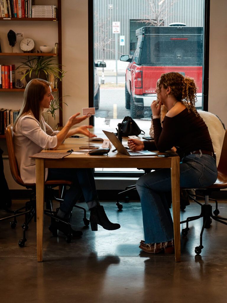 Roundtable discussion with local business owners exploring brand stories of connection, belonging, and self-expression