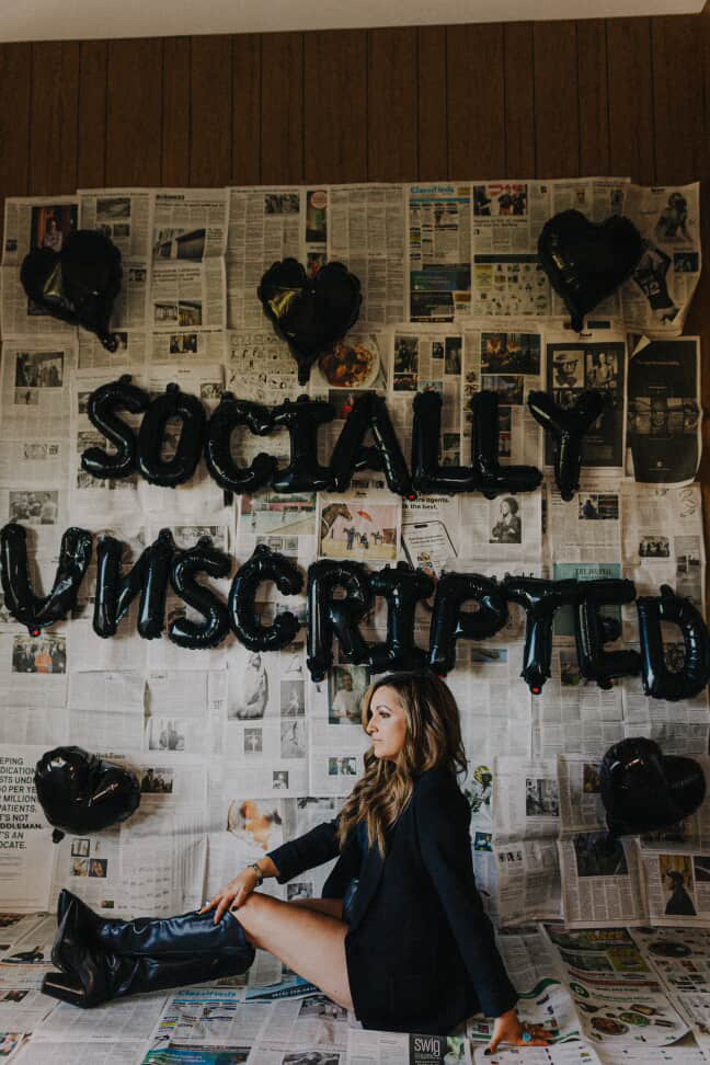 Candid photo of Krystal Herrera capturing content behind the scenes, evoking her artistic and documentary approach