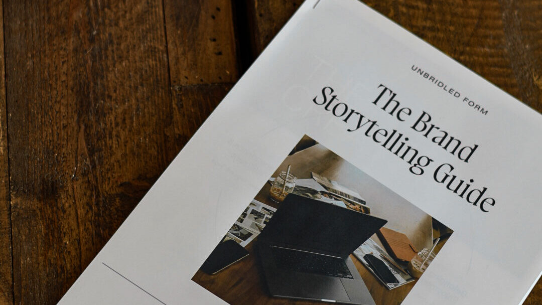 Creative entrepreneur reviewing the brand storytelling guide to uncover their brand story.